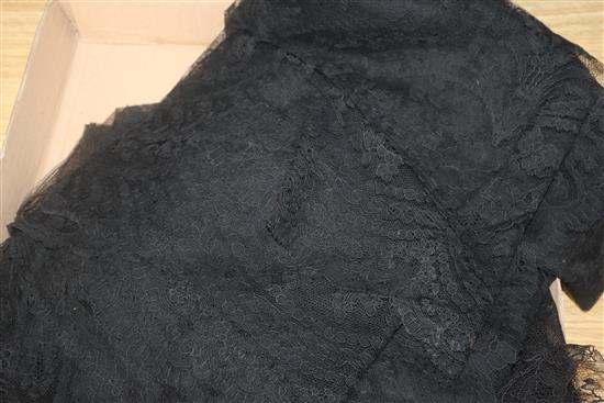 A black Chantilly lace mantilla, a lace stole, various lace bonnets, veils and a collar